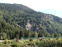 Au loin, le rocher d'escalade de la Duchere.